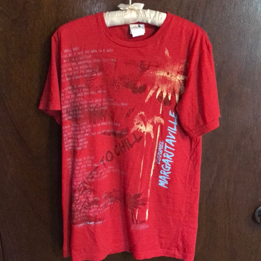 Red, yellow, white, blue tee shirt from Jimmy Buffet’s Margaritaville.